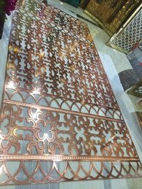 China Champagne Laser Stainless Steel Divider Partition Carved Screens Restaurant Hollow Wall Panel Suppliers supplier